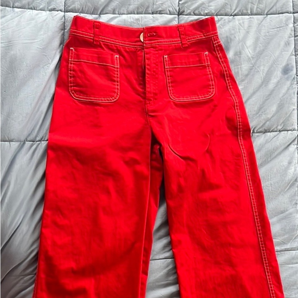 Red cropped wide-legged pants with contrast stitch—cute & funky!